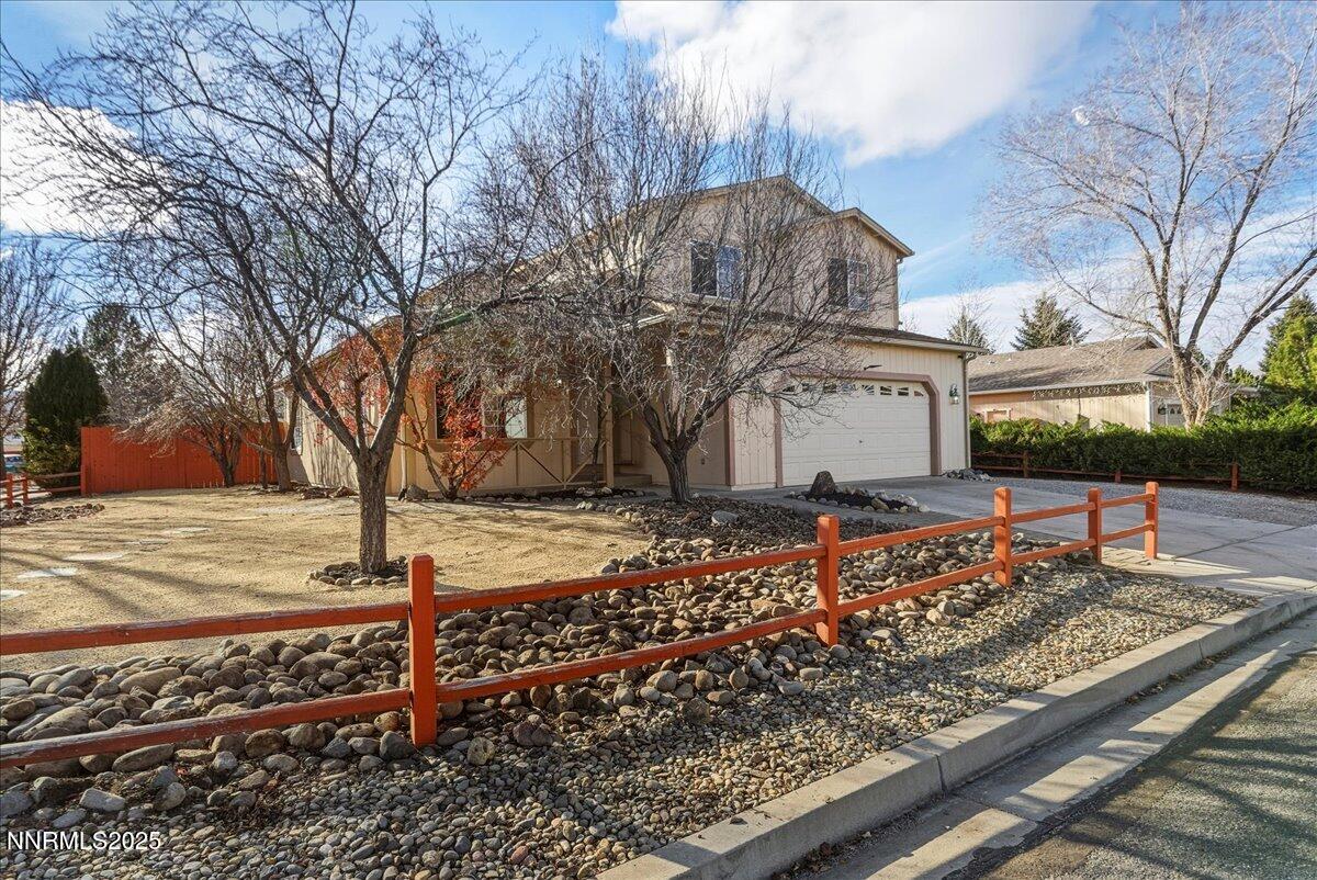 17598 Elk Court Reno, NV 89508 - Photo 2 of 43 a front view of a house with a yard