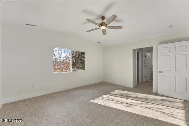 a view of a livingroom with a fan