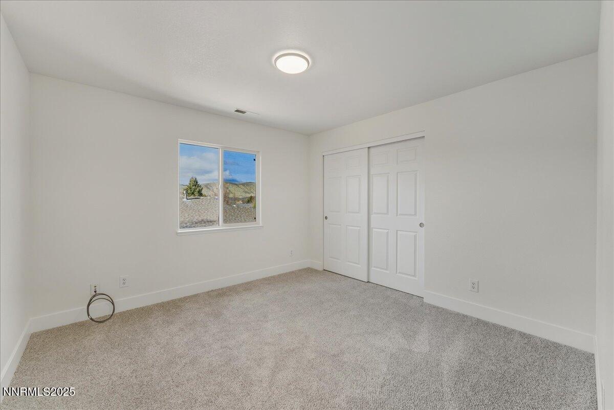 17598 Elk Court Reno, NV 89508 - Photo 27 of 43 a view of an empty room with a window