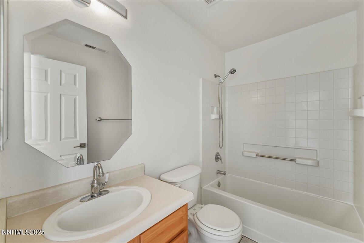 17598 Elk Court Reno, NV 89508 - Photo 29 of 43 a bathroom with a sink toilet and shower
