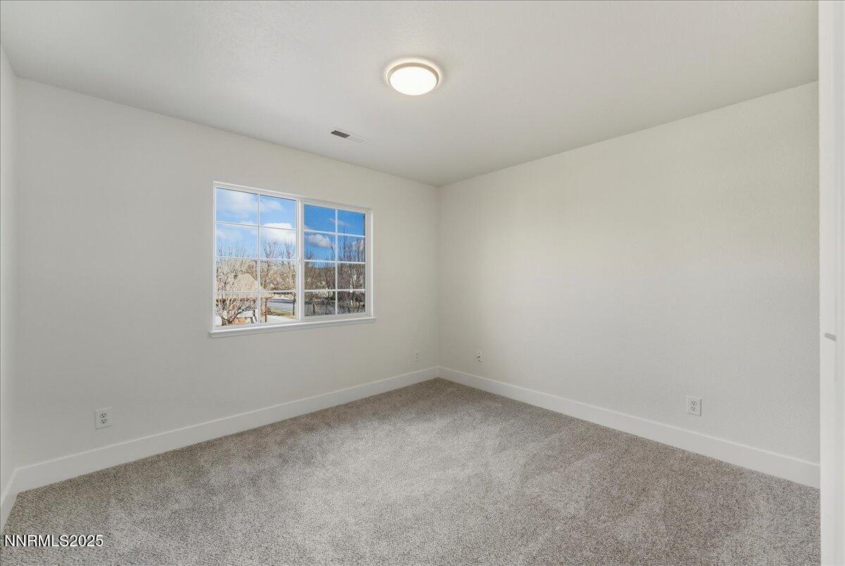 17598 Elk Court Reno, NV 89508 - Photo 30 of 43 an empty room with a window
