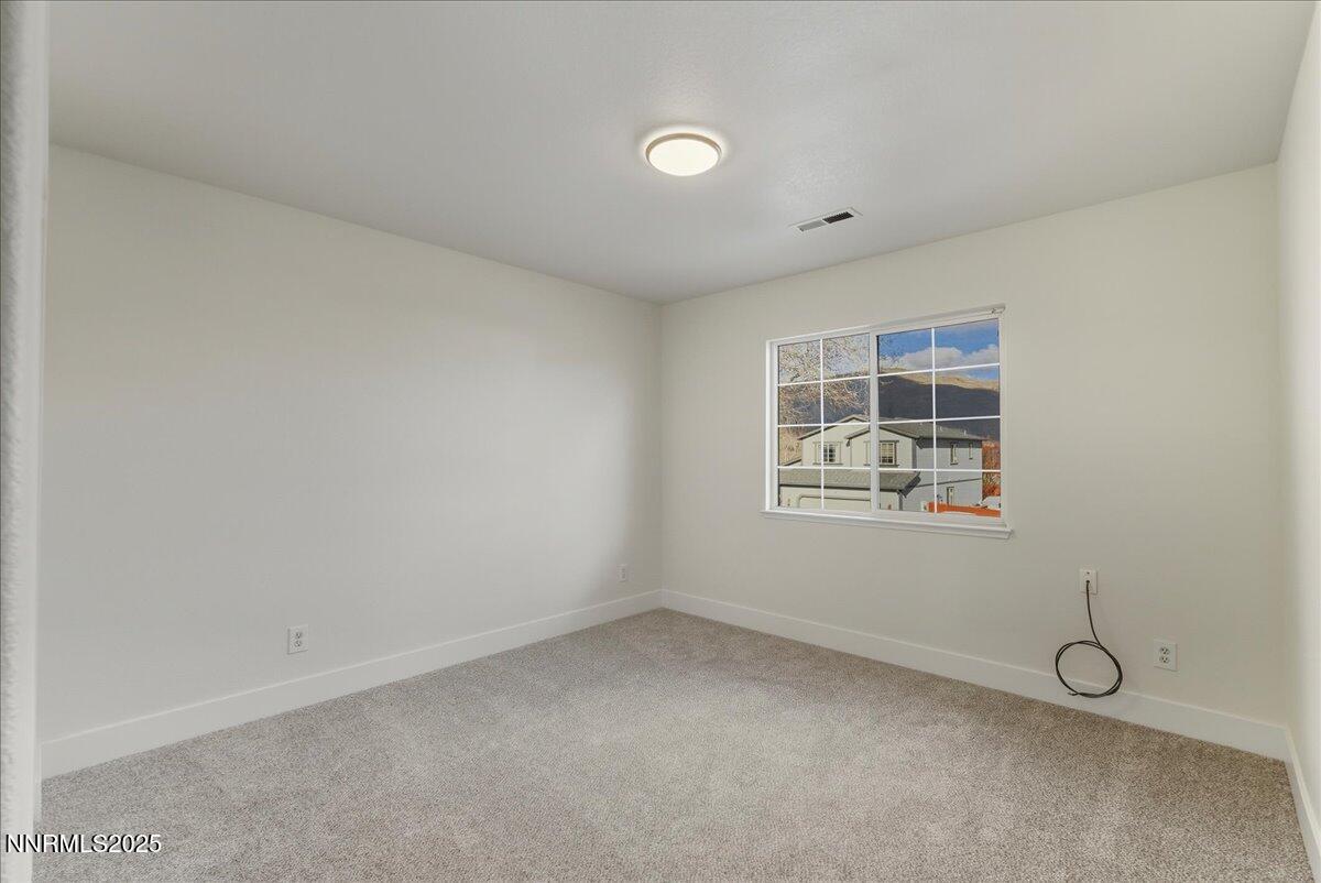 17598 Elk Court Reno, NV 89508 - Photo 32 of 43 an empty room with a window