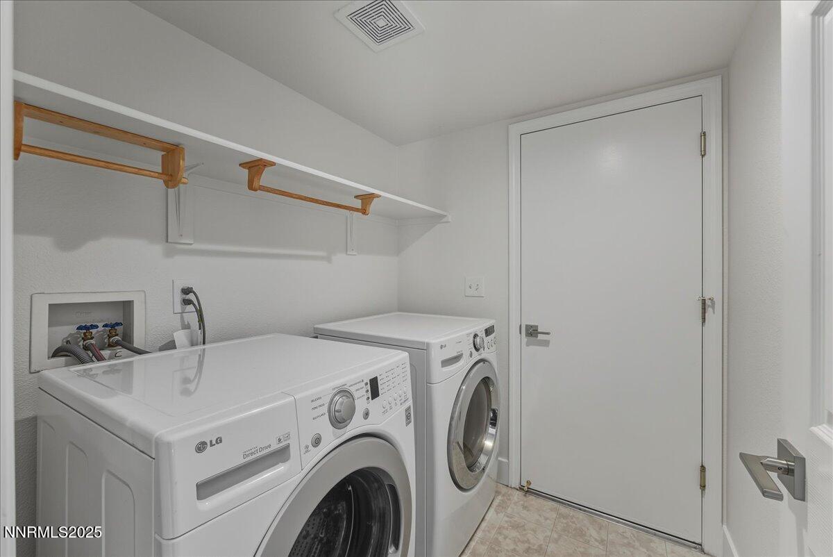 17598 Elk Court Reno, NV 89508 - Photo 34 of 43 a utility room with dryer and washer