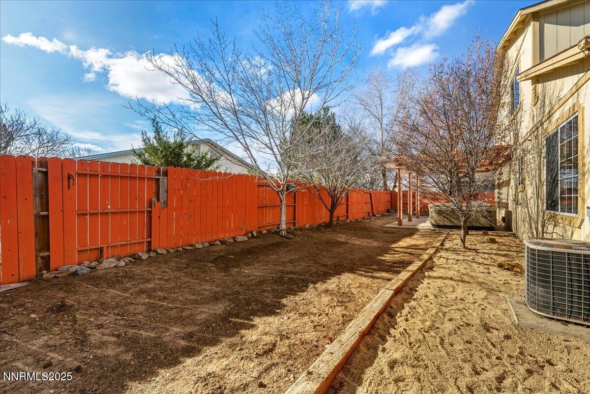 17598 Elk Court Reno, NV 89508 - Photo 42 of 43 a view of a yard with an trees
