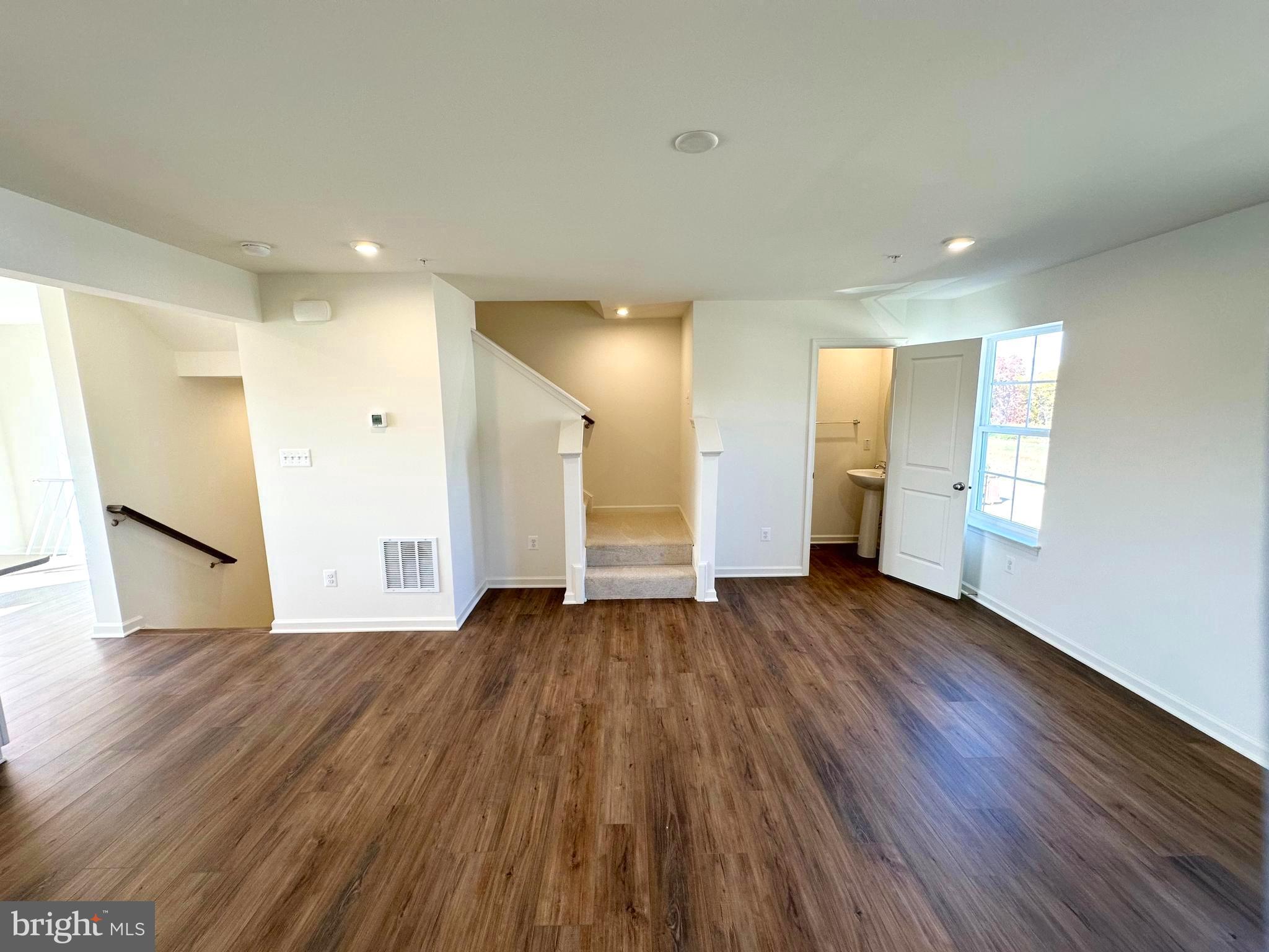 171 Homestead Drive Hanover, PA 17331 - Photo 16 of 34 a view of an empty room with wooden floor