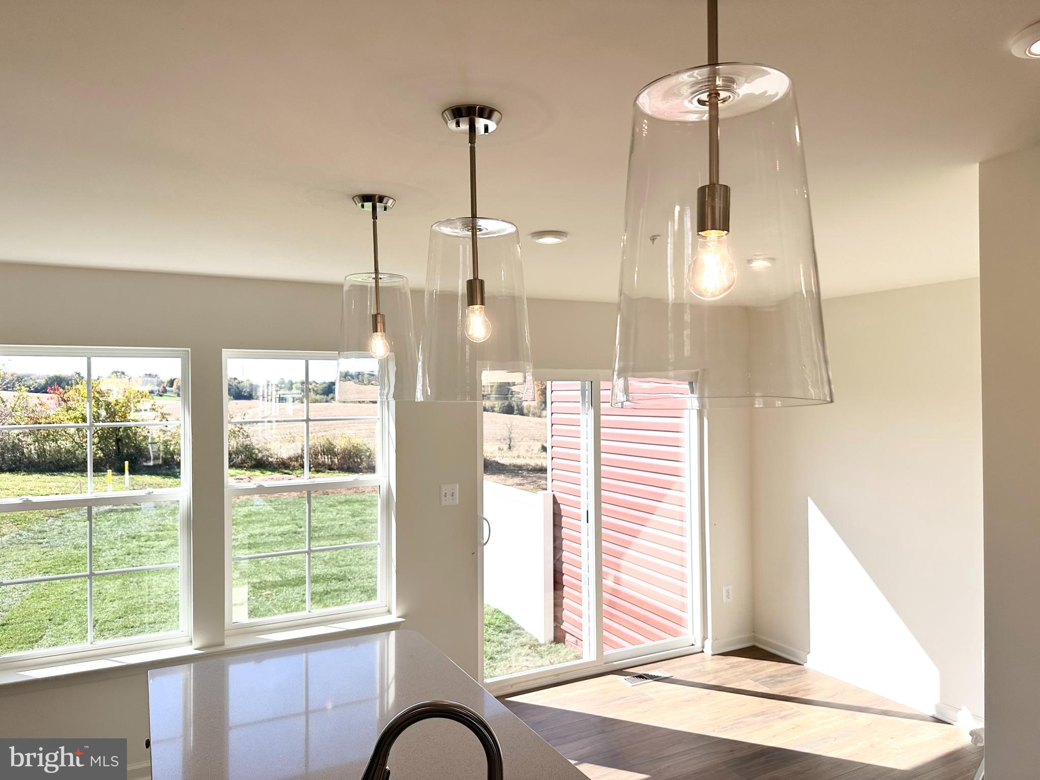 171 Homestead Drive Hanover, PA 17331 - Photo 9 of 34 a bathroom with a glass shower and windows