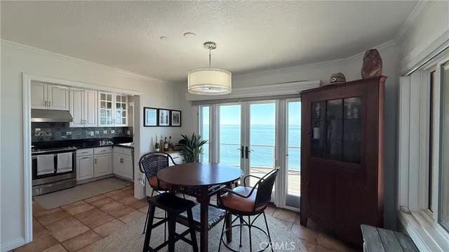 a view of a sink storage and utility room