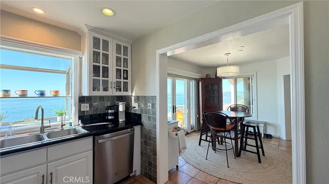 a bathroom with a glass shower door and a bathtub