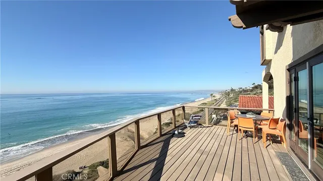 a view of balcony with wooden floor and outdoor space
