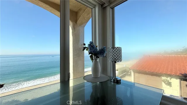 a view of balcony with two chairs