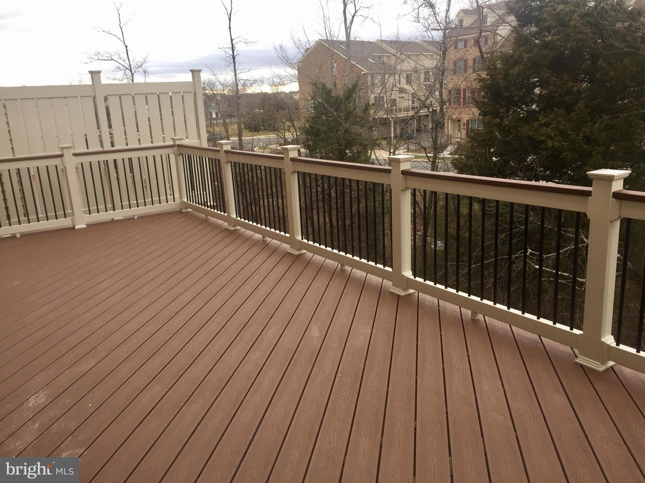 22595 Windsor Locks Square Ashburn, VA 20148 - Photo 6 of 13 a view of balcony with wooden floor