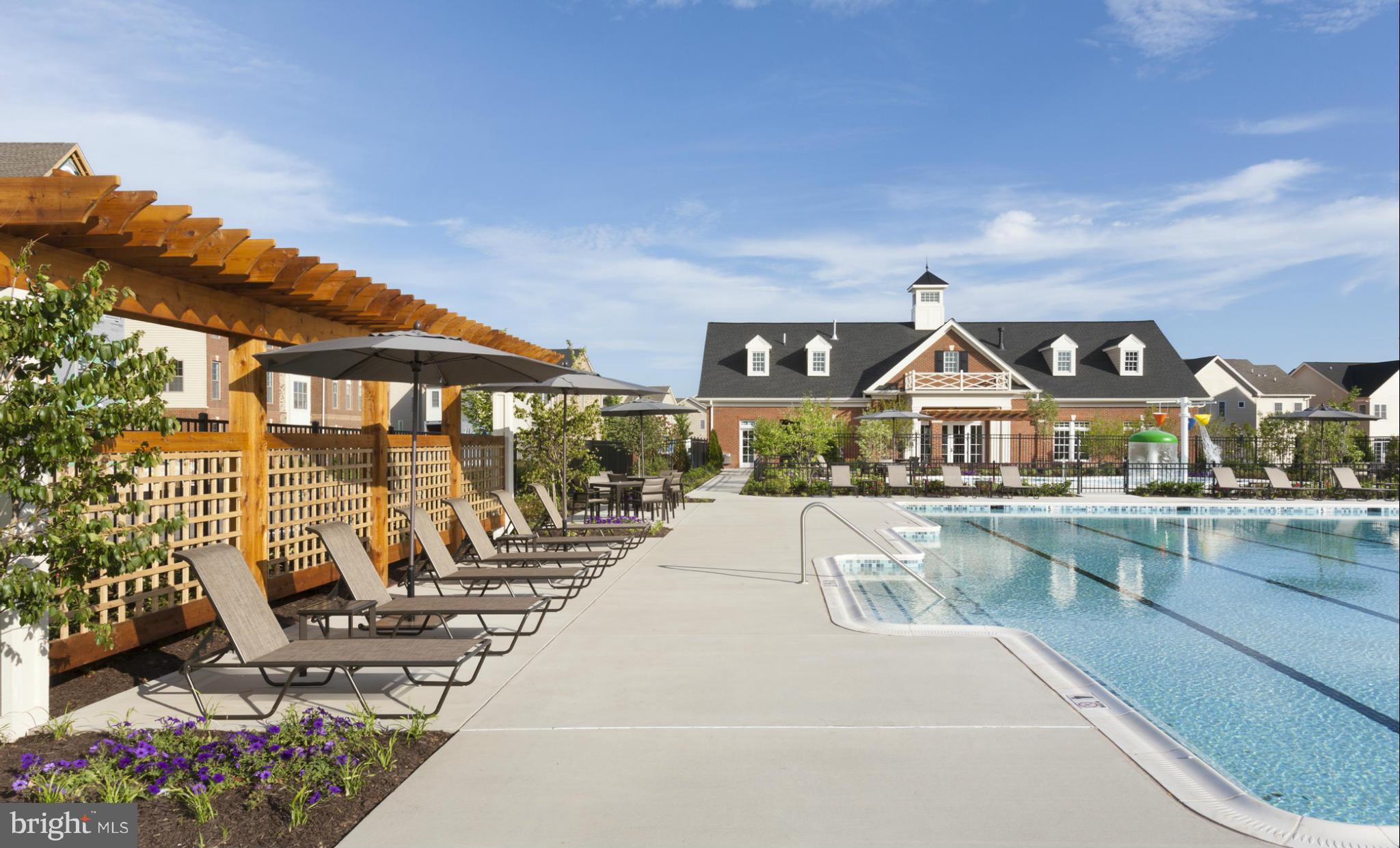 22595 Windsor Locks Square Ashburn, VA 20148 - Photo 8 of 13 a view of a swimming pool with a patio