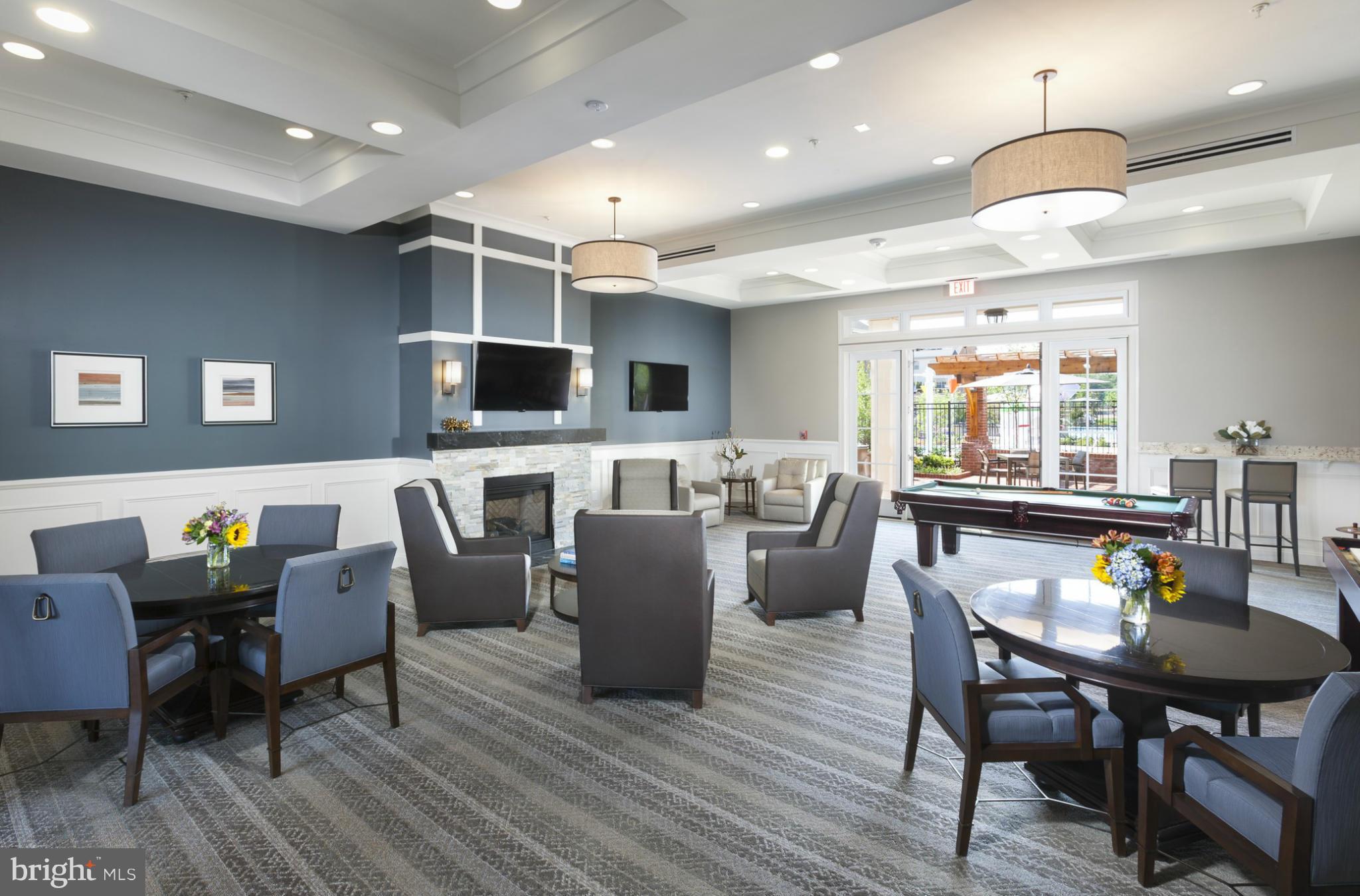22595 Windsor Locks Square Ashburn, VA 20148 - Photo 9 of 13 a view of a dining room with furniture window and wooden floor
