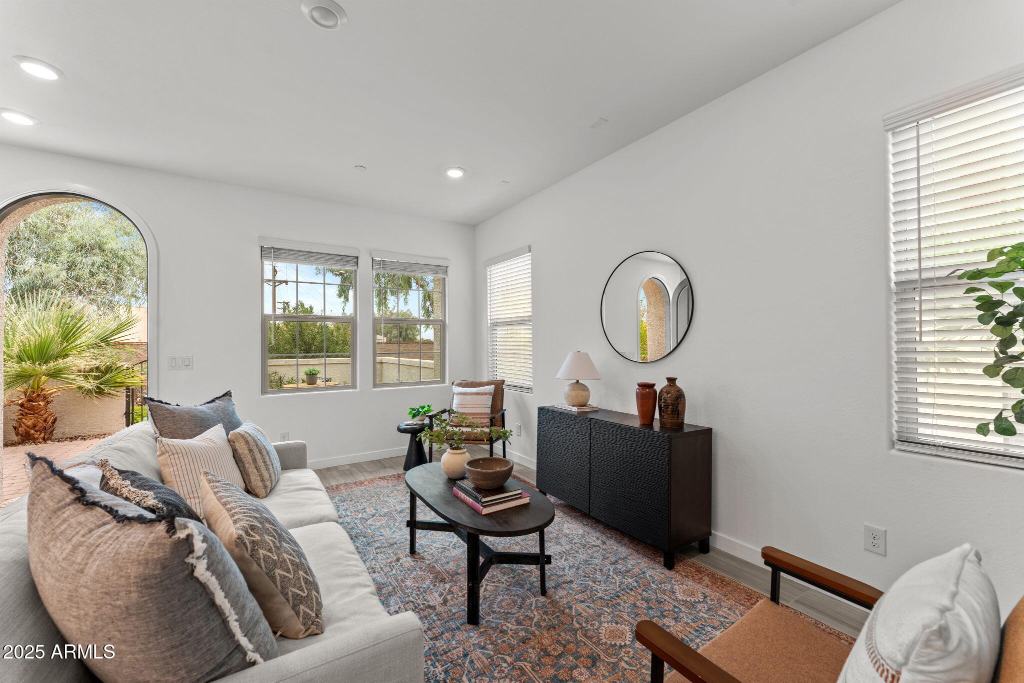 4077 South Sabrina Drive, Unit 127 Chandler, AZ 85248 - Photo 13 of 46 a living room with furniture a window and a lamp
