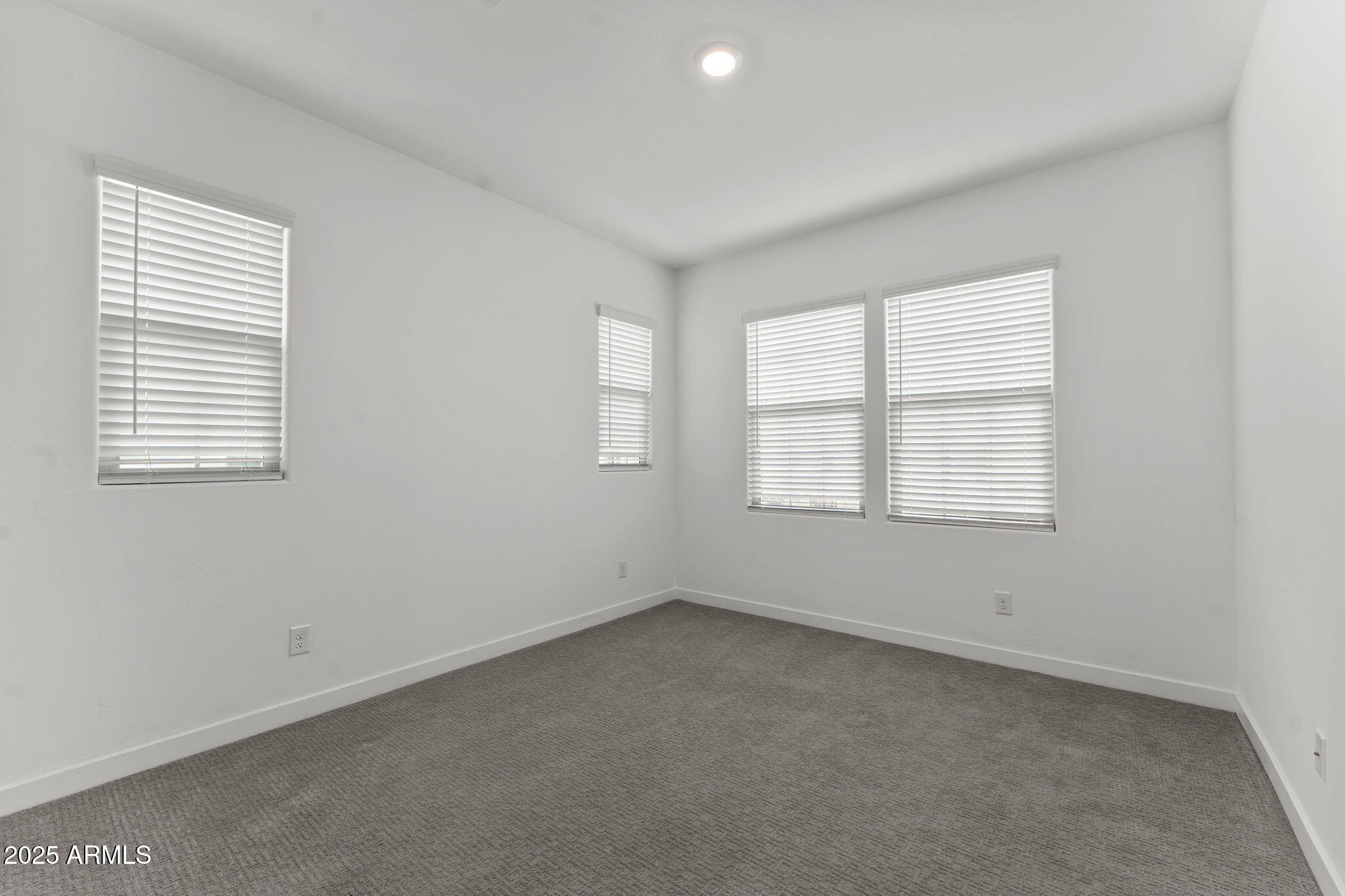 4077 South Sabrina Drive, Unit 127 Chandler, AZ 85248 - Photo 19 of 46 an empty room with a window