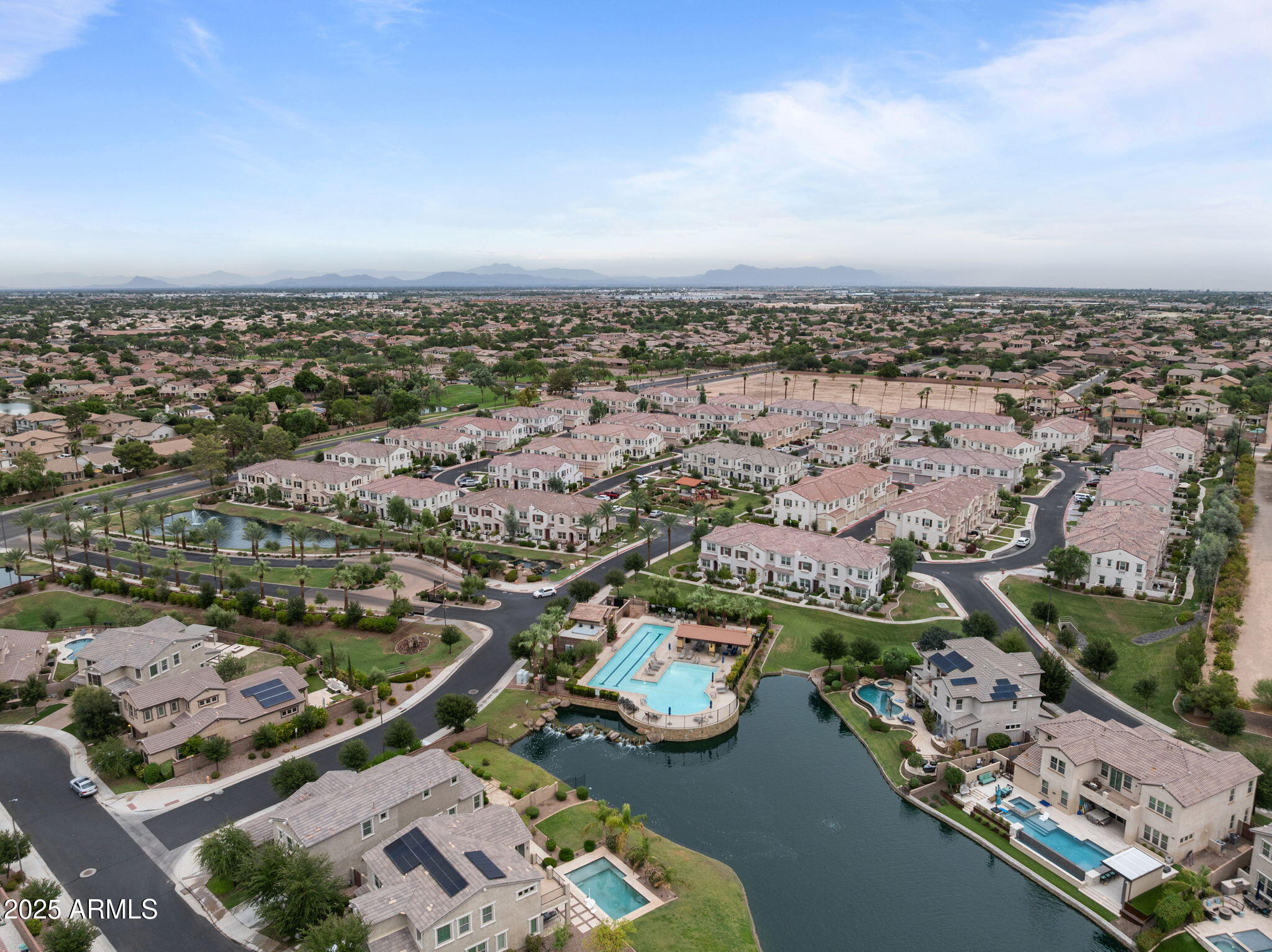 4077 South Sabrina Drive, Unit 127 Chandler, AZ 85248 - Photo 36 of 46 an aerial view of a city with lots of residential buildings