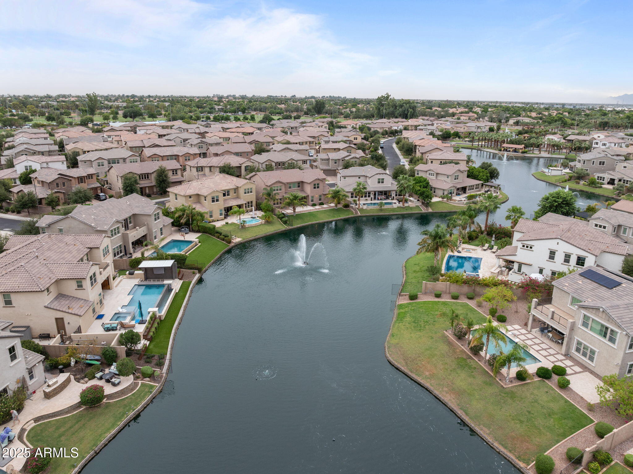 4077 South Sabrina Drive, Unit 127 Chandler, AZ 85248 - Photo 42 of 46 an aerial view of a city with lots of residential buildings