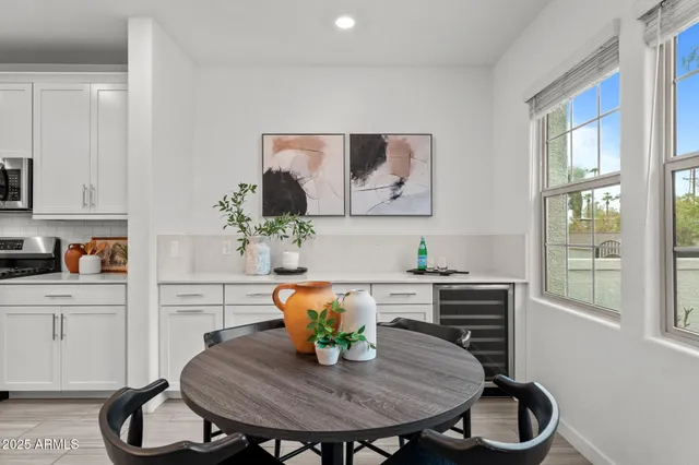 a workspace with furniture and a potted plant