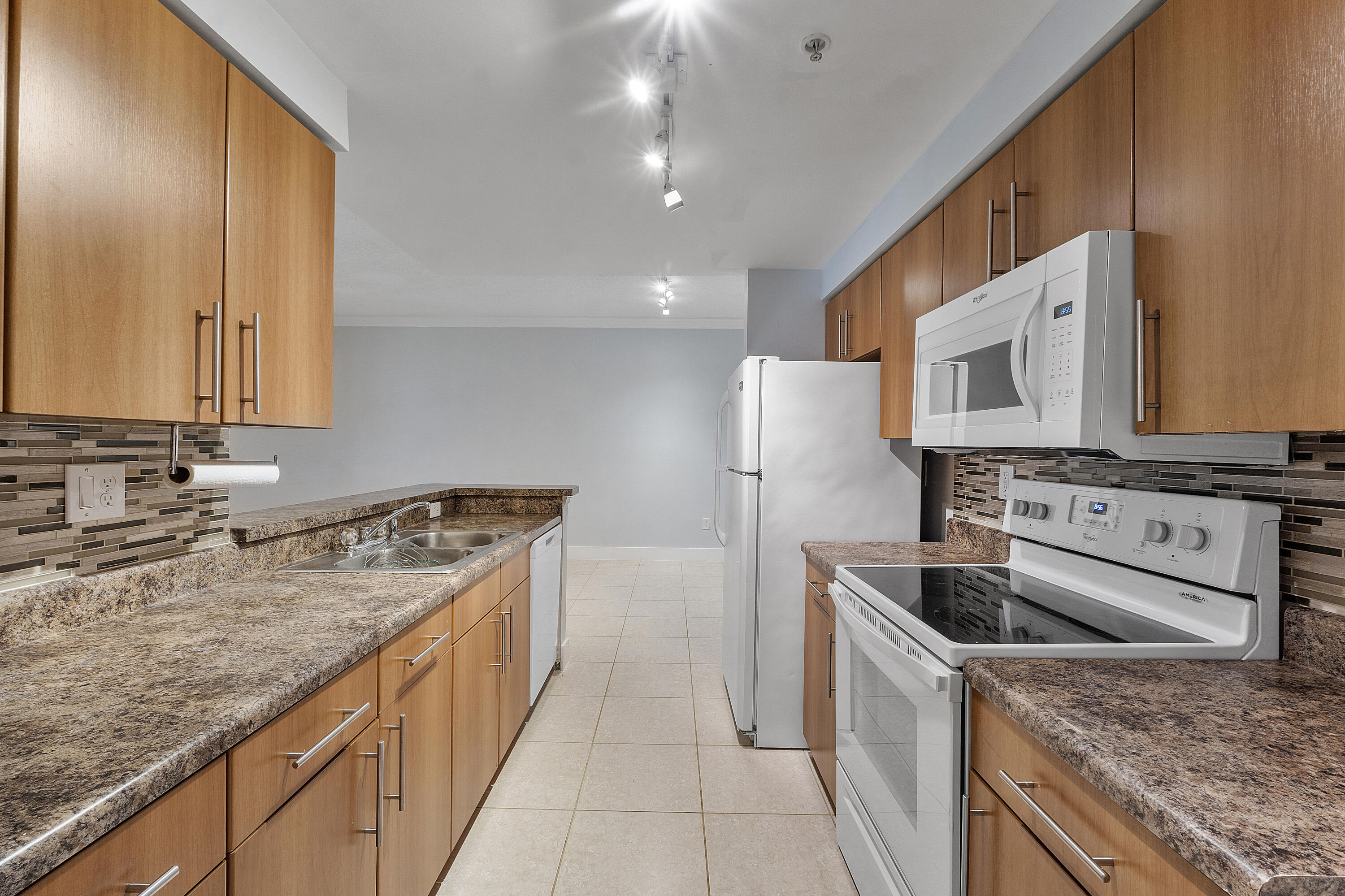 5980 West Sample Road, Unit 104 Coral Springs, FL 33067 - Photo 3 of 12 5980 W SAMPLE ROAD U104_008