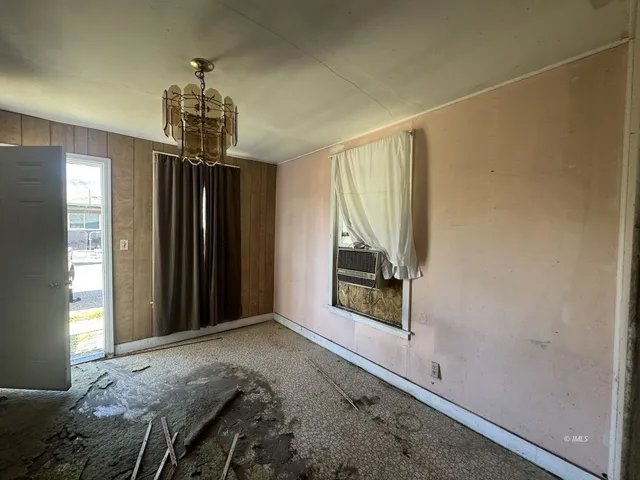 a view of a livingroom with a staircase