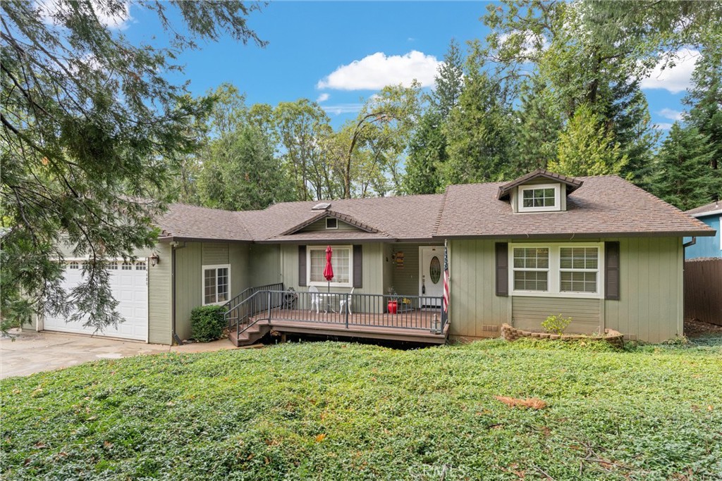 14689 Carnegie Road Magalia, CA 95954 - Photo 1 of 32 a front view of a house with a yard