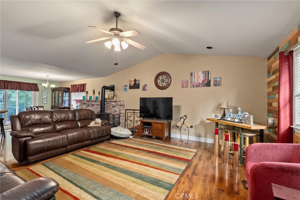 14689 Carnegie Road Magalia, CA 95954 - Photo 11 of 32 a living room with furniture and a flat screen tv
