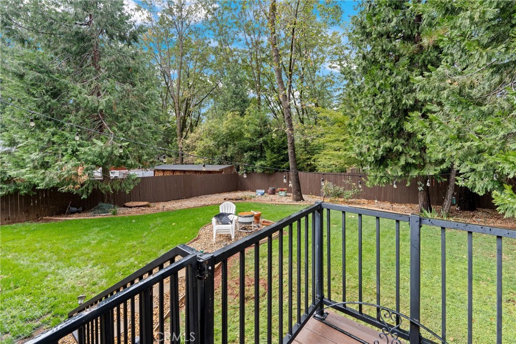 14689 Carnegie Road Magalia, CA 95954 - Photo 27 of 32 a balcony with trees in the background