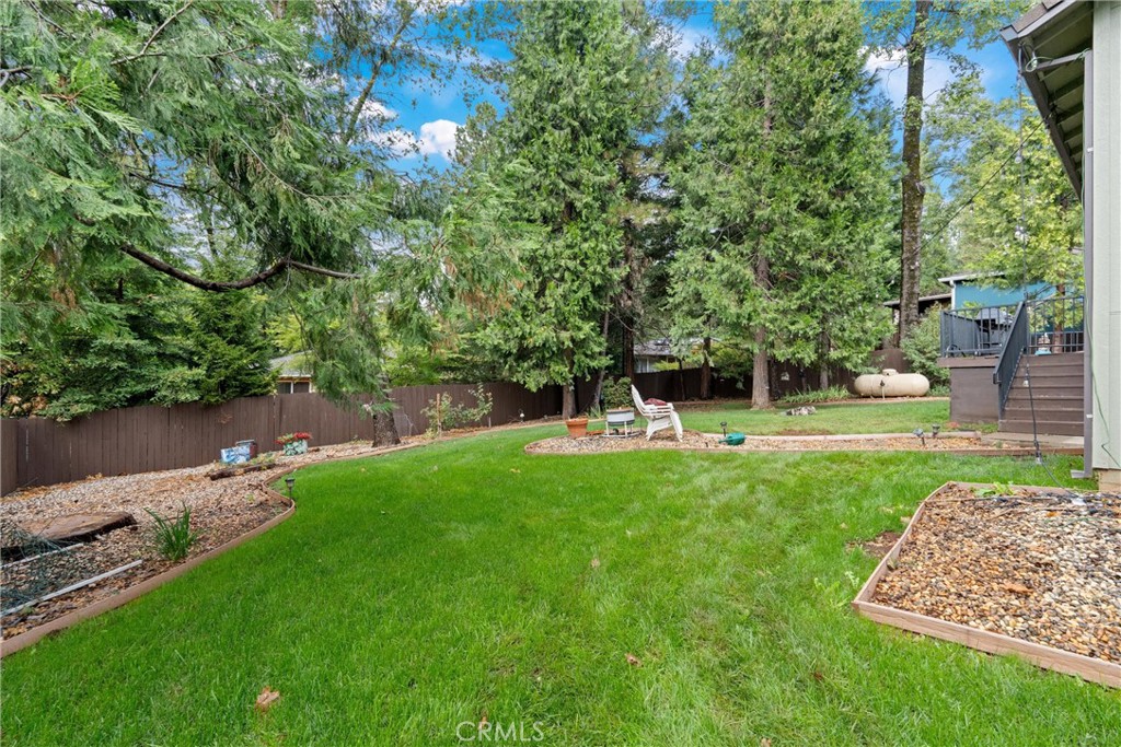 14689 Carnegie Road Magalia, CA 95954 - Photo 28 of 32 a garden view with a sitting space