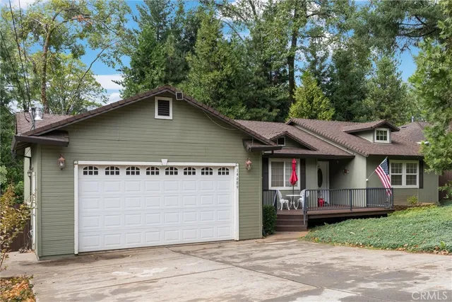 a house with trees in the background