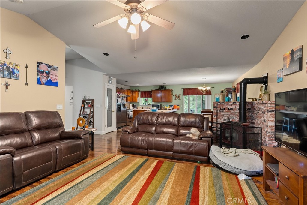 14689 Carnegie Road Magalia, CA 95954 - Photo 10 of 32 a living room with furniture and a wooden floor