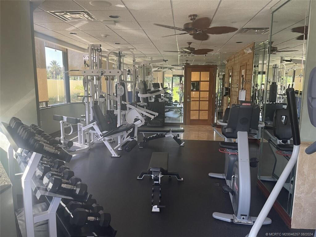 9500 South Ocean Drive, Unit 1908 Jensen Beach, FL 34957 - Photo 23 of 25 a view of a room with gym equipment
