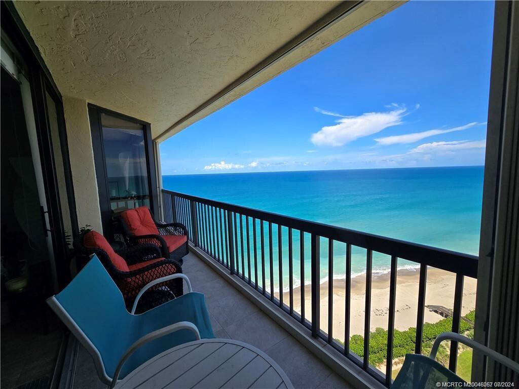 9500 South Ocean Drive, Unit 1908 Jensen Beach, FL 34957 - Photo 10 of 25 a bedroom with furniture and a window