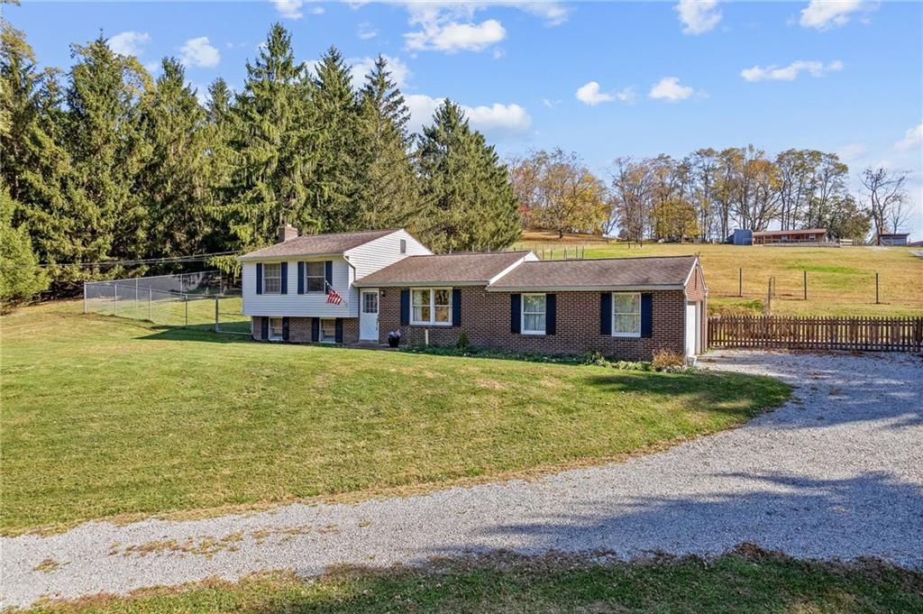 1060 Sugar Run Road Finleyville, PA 15332 - Photo 1 of 50 4 acres w/4 beds, 2 baths, barn, pool, fenced in yard, and more around the corner from Mingo Creek Park!