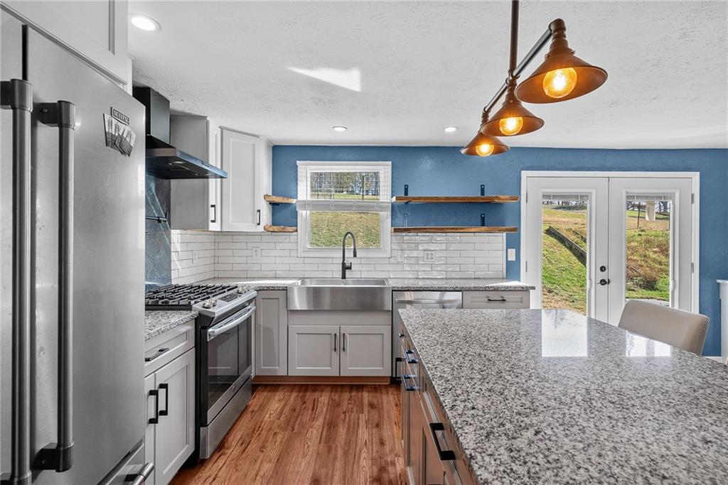 1060 Sugar Run Road Finleyville, PA 15332 - Photo 12 of 50 Modern, sleek, updated w/SS appliances and large island!