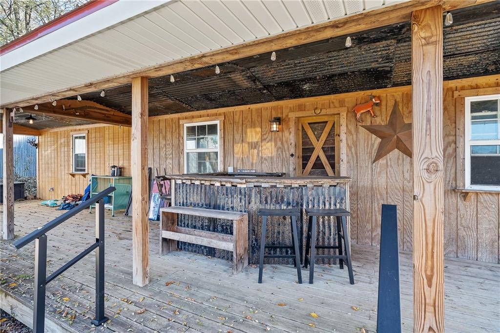 1060 Sugar Run Road Finleyville, PA 15332 - Photo 34 of 50 Fenced in and equipped w/outdoor kitchen, fire pit, covered deck w/bar, 3 horse stalls and room able to convert to a 4th stall!