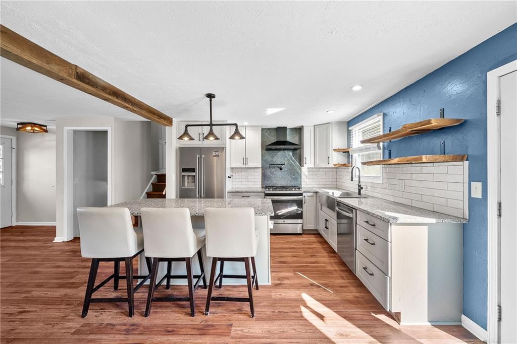 1060 Sugar Run Road Finleyville, PA 15332 - Photo 10 of 50 Modern, sleek, updated w/SS appliances and large island!