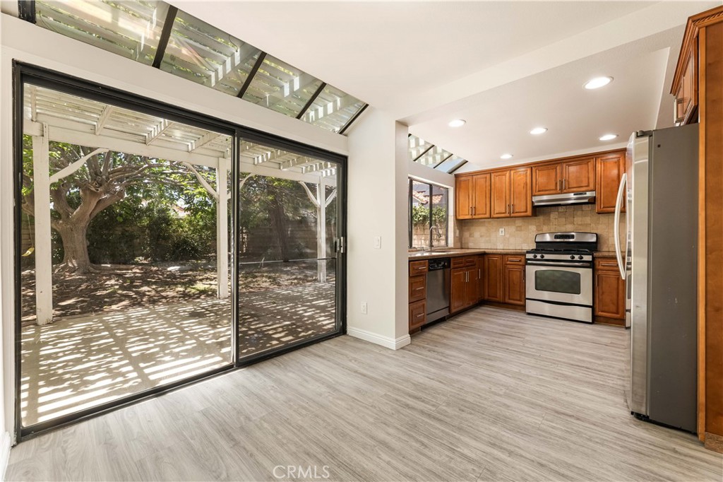 12065 Shadow Glen Lane Porter Ranch, CA 91326 - Photo 35 of 46 Patio Door from Kitchen