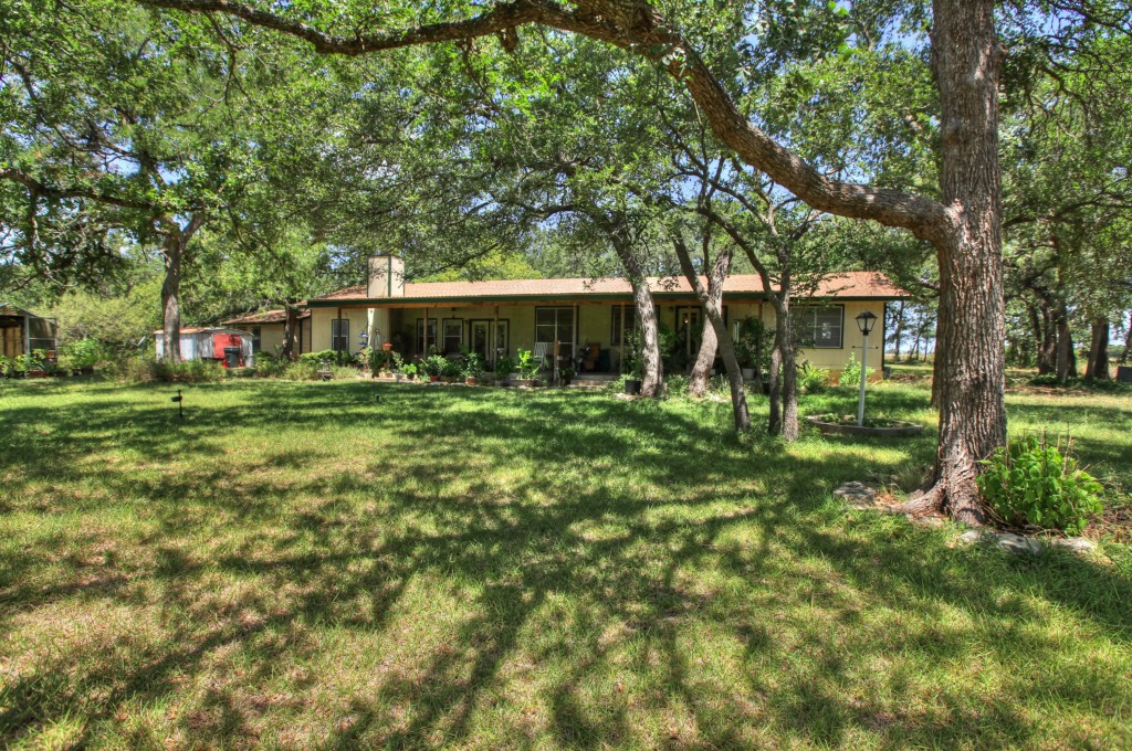 277 County Road 252 Georgetown, TX 78633 - Photo 1 of 1 a front view of a house with a yard