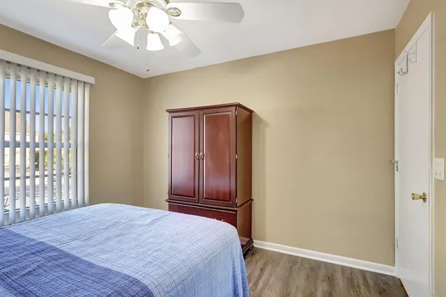 a work room with furniture and windows