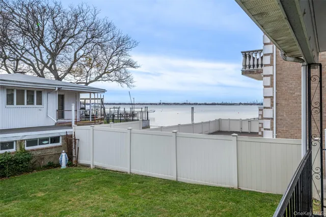 a view of a house with a sink and a yard