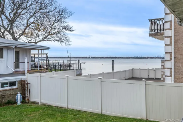 a view of a house with backyard and kitchen