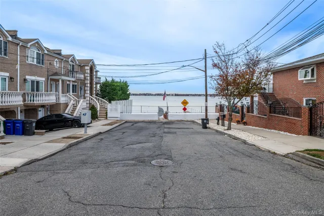 a view of a street with cars