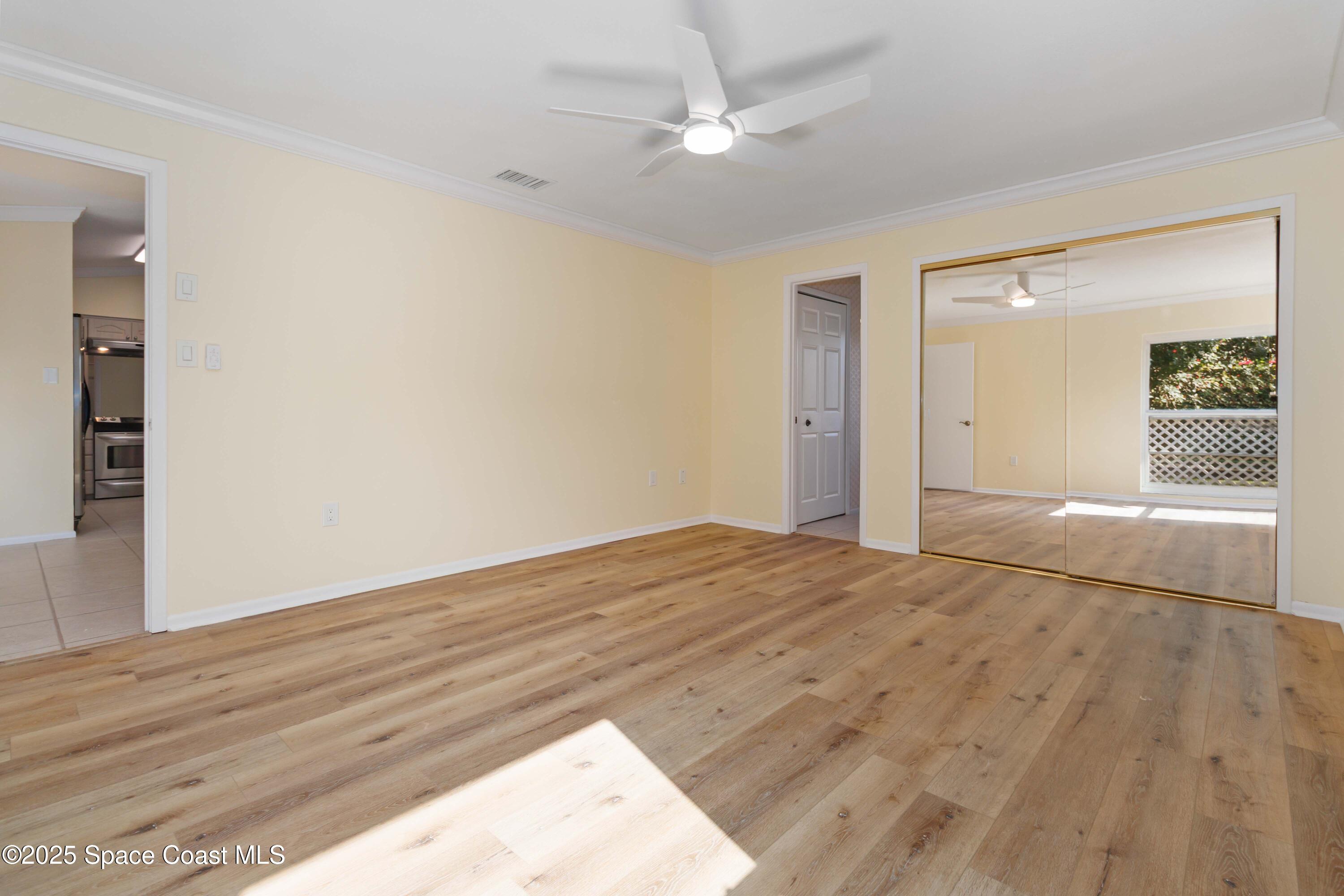 2355 Raintree Lake Circle Merritt Island, FL 32953 - Photo 31 of 47 wooden floor in an empty room