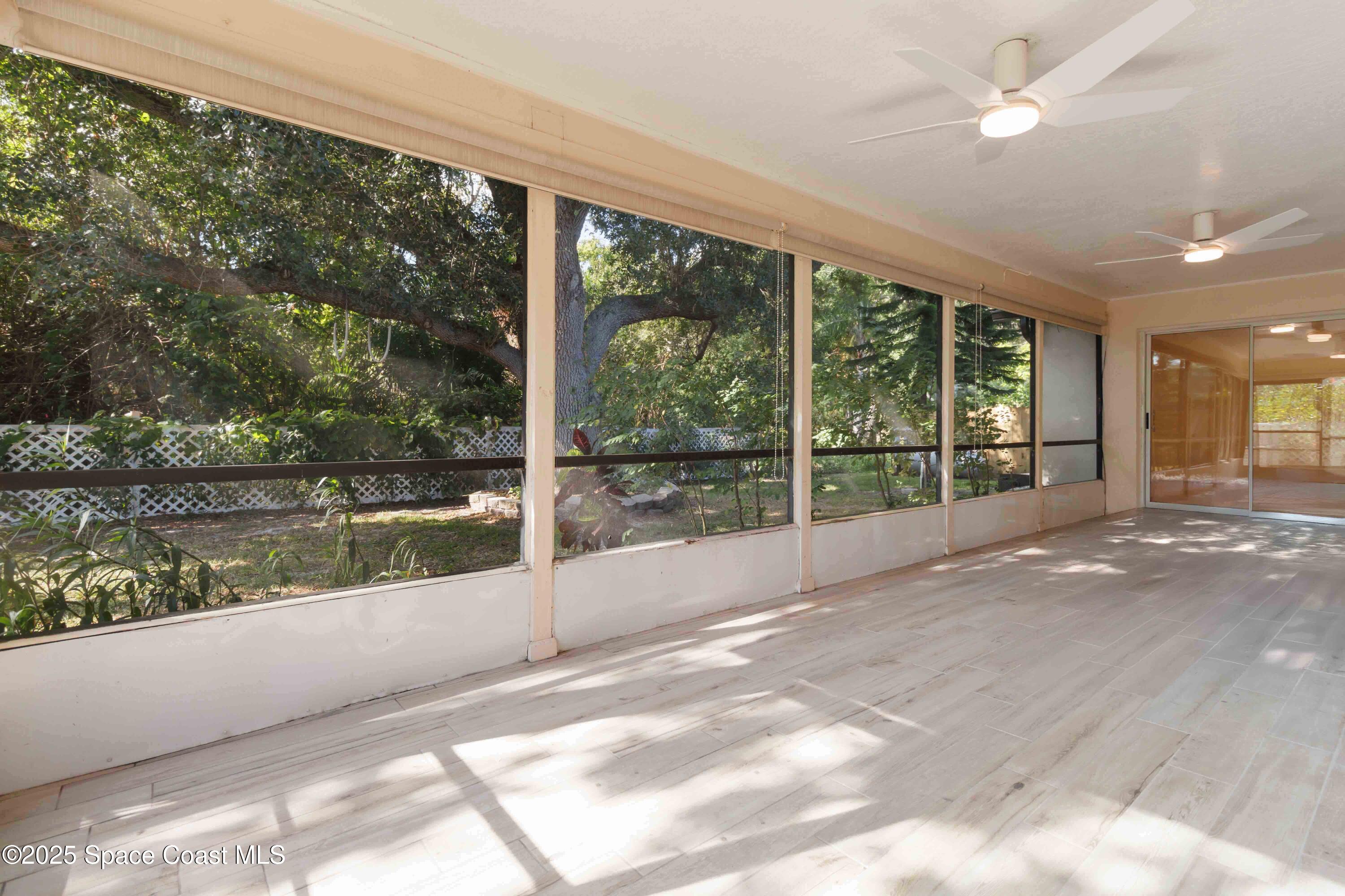 2355 Raintree Lake Circle Merritt Island, FL 32953 - Photo 36 of 47 a view of a garden from a window
