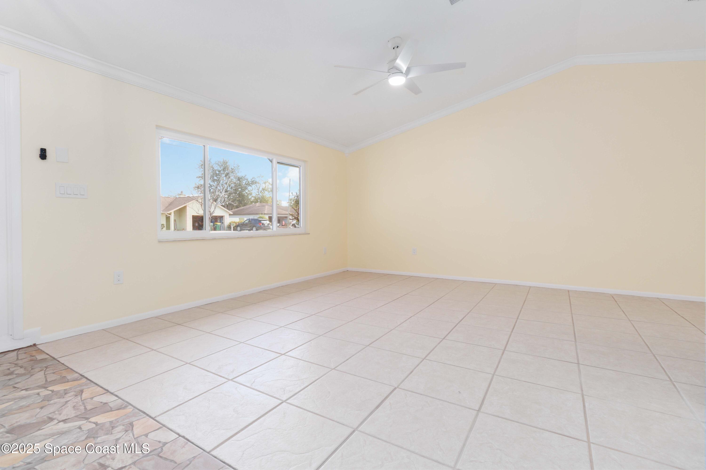 2355 Raintree Lake Circle Merritt Island, FL 32953 - Photo 5 of 47 an empty room with windows