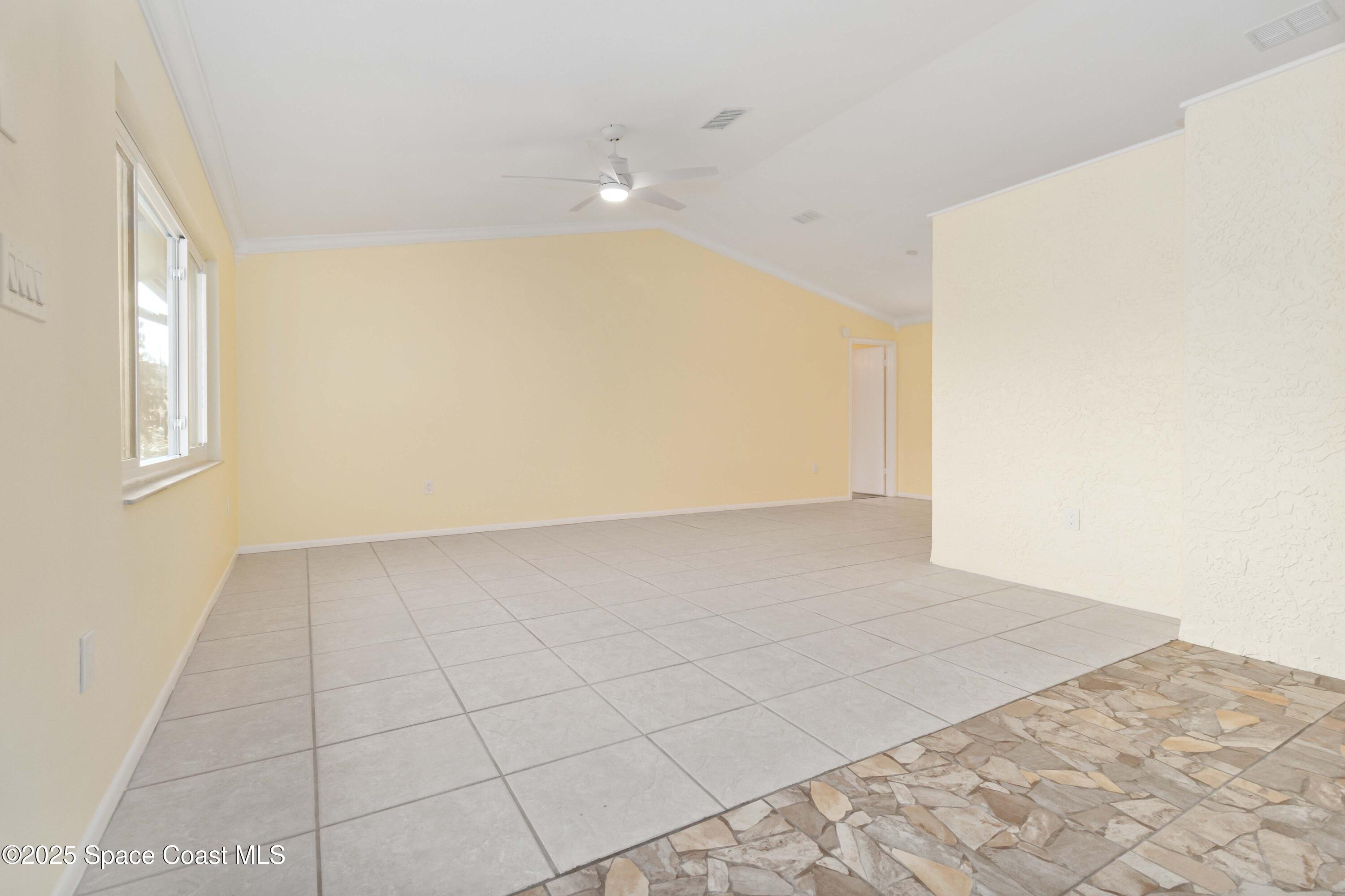 2355 Raintree Lake Circle Merritt Island, FL 32953 - Photo 6 of 47 a view of an empty room