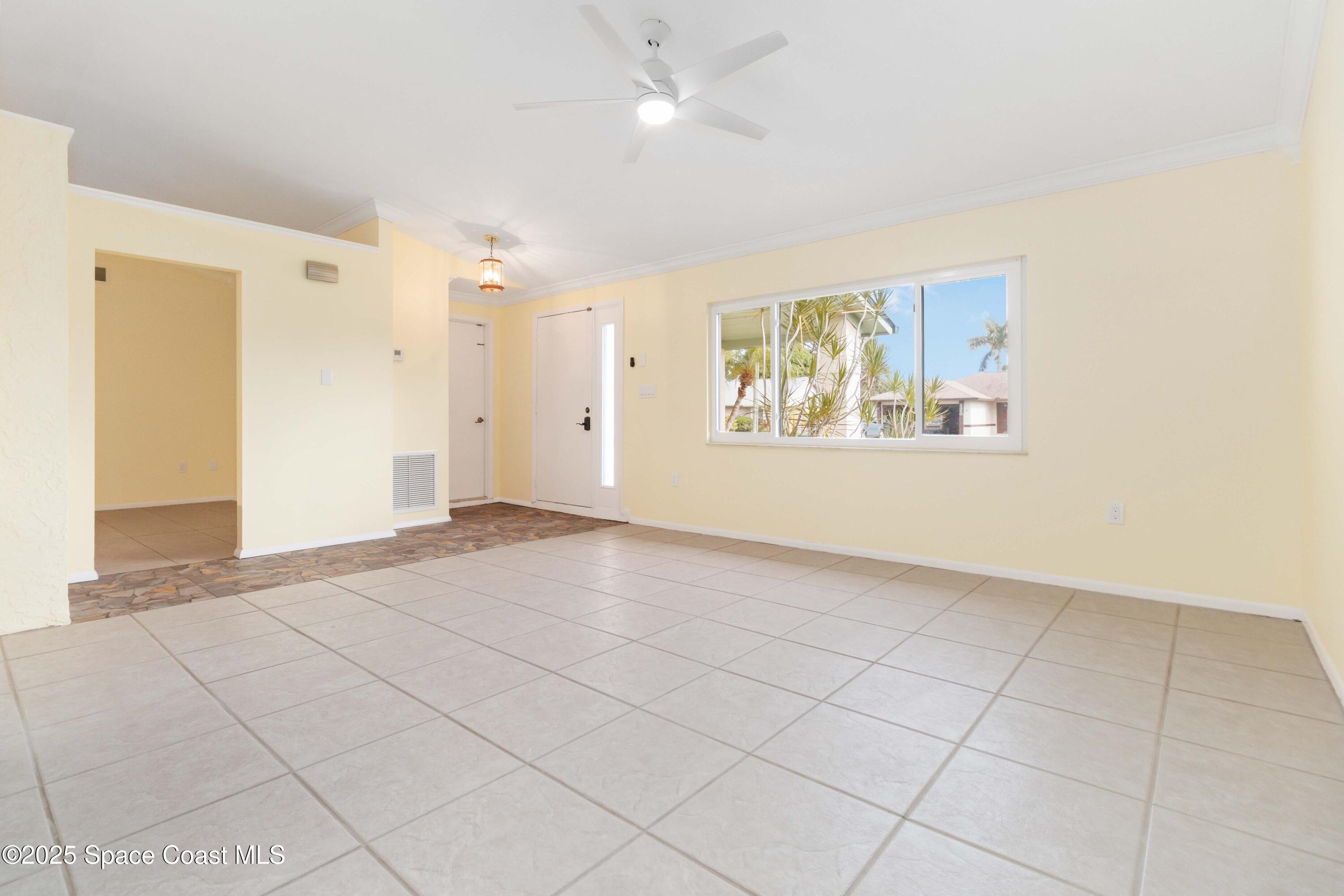 2355 Raintree Lake Circle Merritt Island, FL 32953 - Photo 8 of 47 a view of an empty room with a window