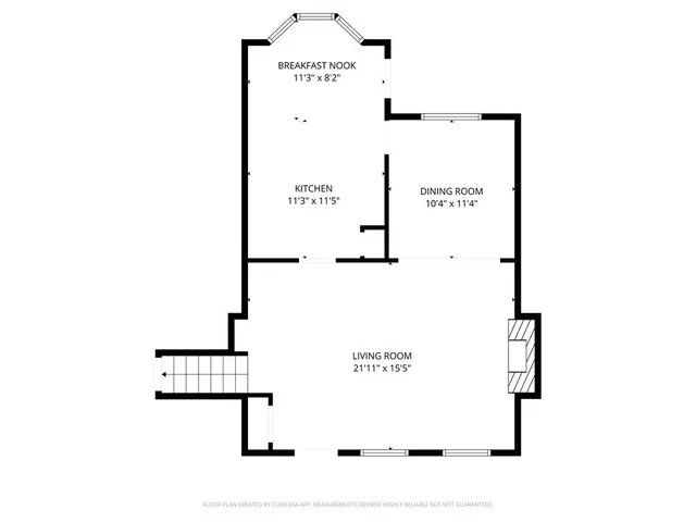 a picture of a bench in front of a wall