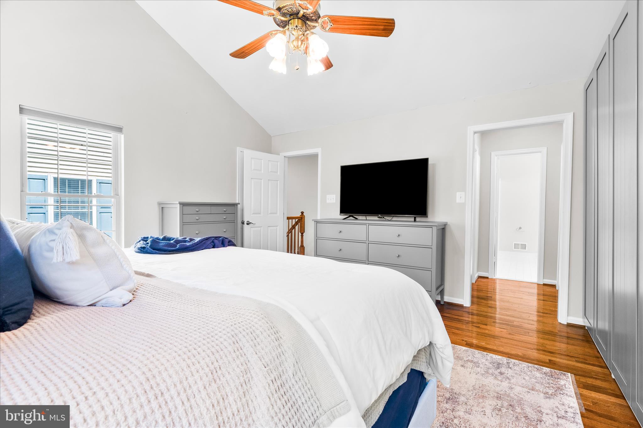 2442 Rippling Brook Road Frederick, MD 21701 - Photo 31 of 85 a bedroom with a bed and a flat screen tv