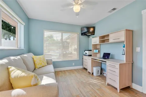 a view of a dining room with furniture window and outside view